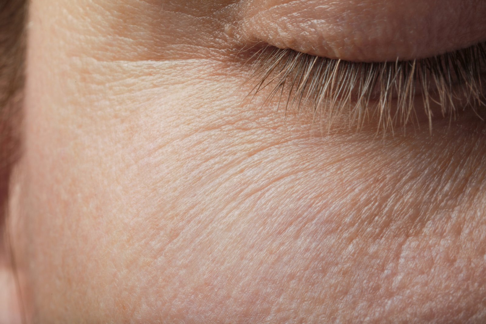 Close-up of woman with smooth, softened skin at Couture Dermatology