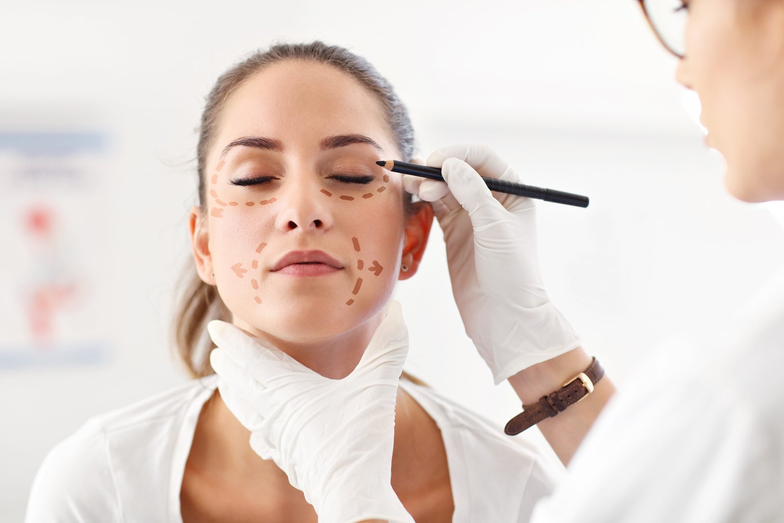 Dermatologist assessing skin pigmentation for melasma treatment at Couture Dermatology Beverly Hills