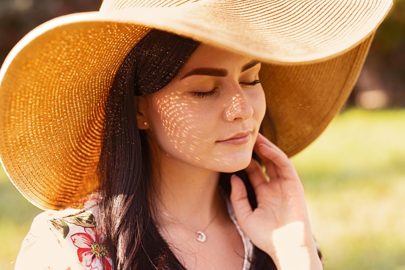 Woman with clear, radiant skin after age spot removal treatment at Couture Dermatology Beverly Hills